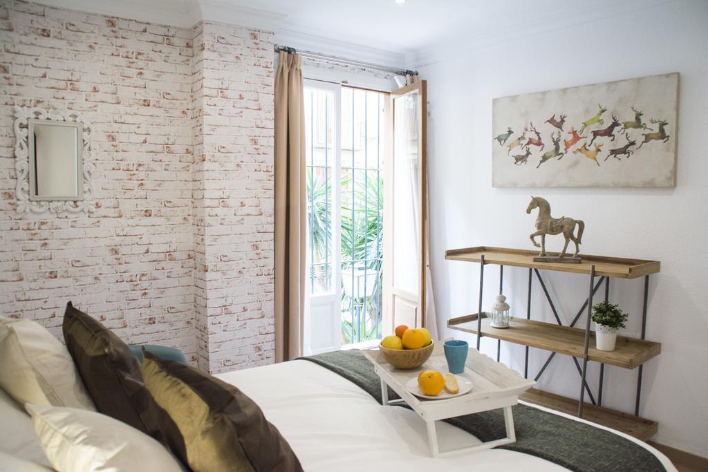 Apartamentos Sevilla Palace Экстерьер фото